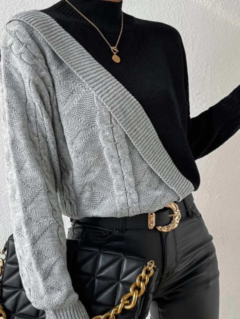 New with tags. Commense black and gray color block sweater